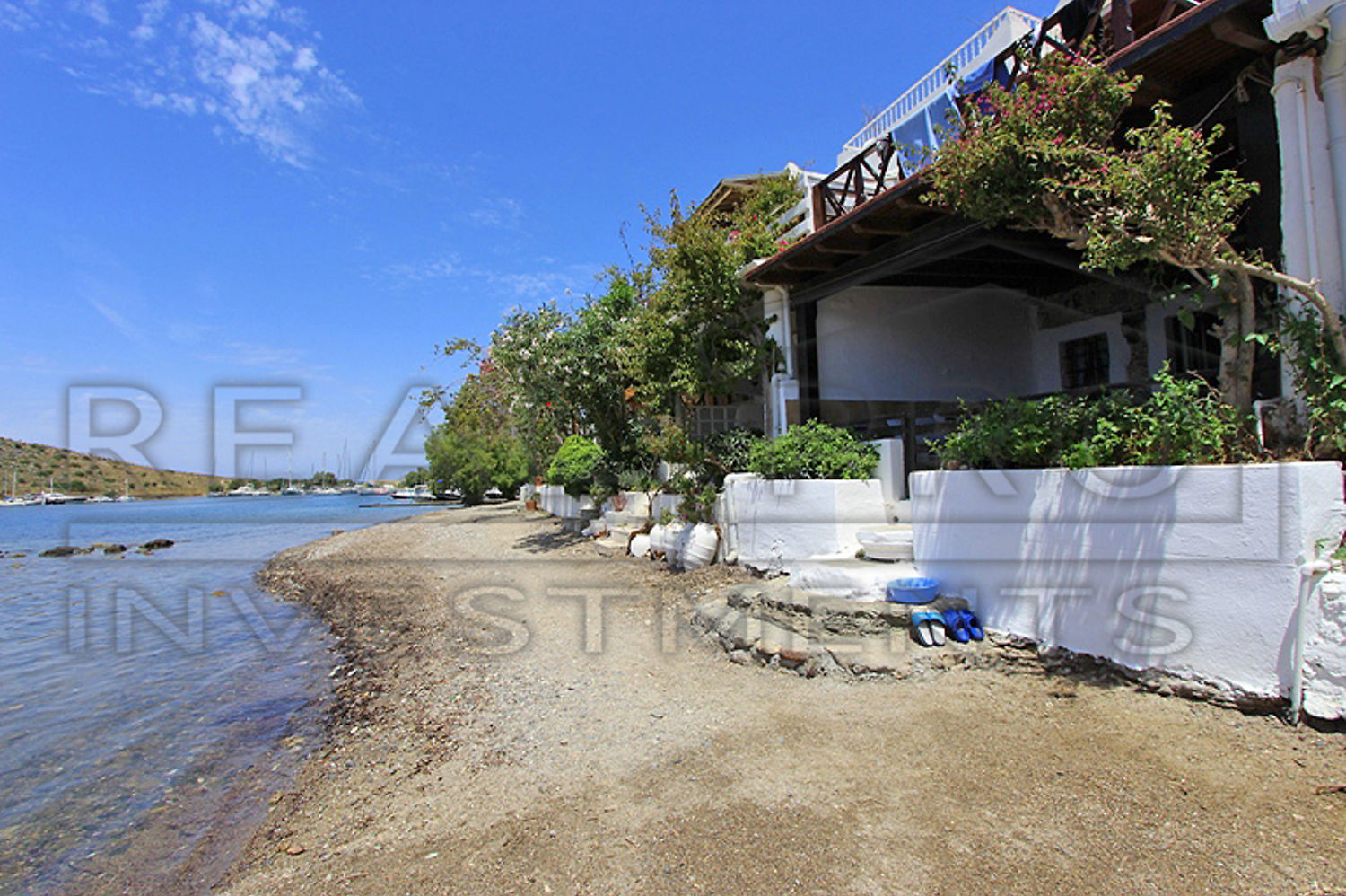 Eşsiz teklif Gümüşlük Bodrum�da Satılık DENIZE SIFIR muhteşem taş ev